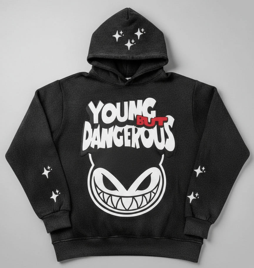 Black hoodie with 'Young But Dangerous' graphic on a gray background